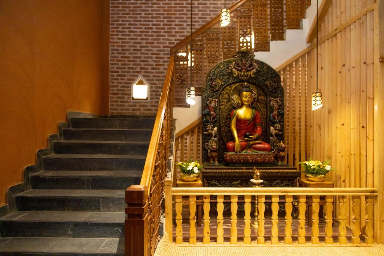 Basera Boutique Hotel Katmandú Exterior foto The Buddha statue at the entrance of the hotel